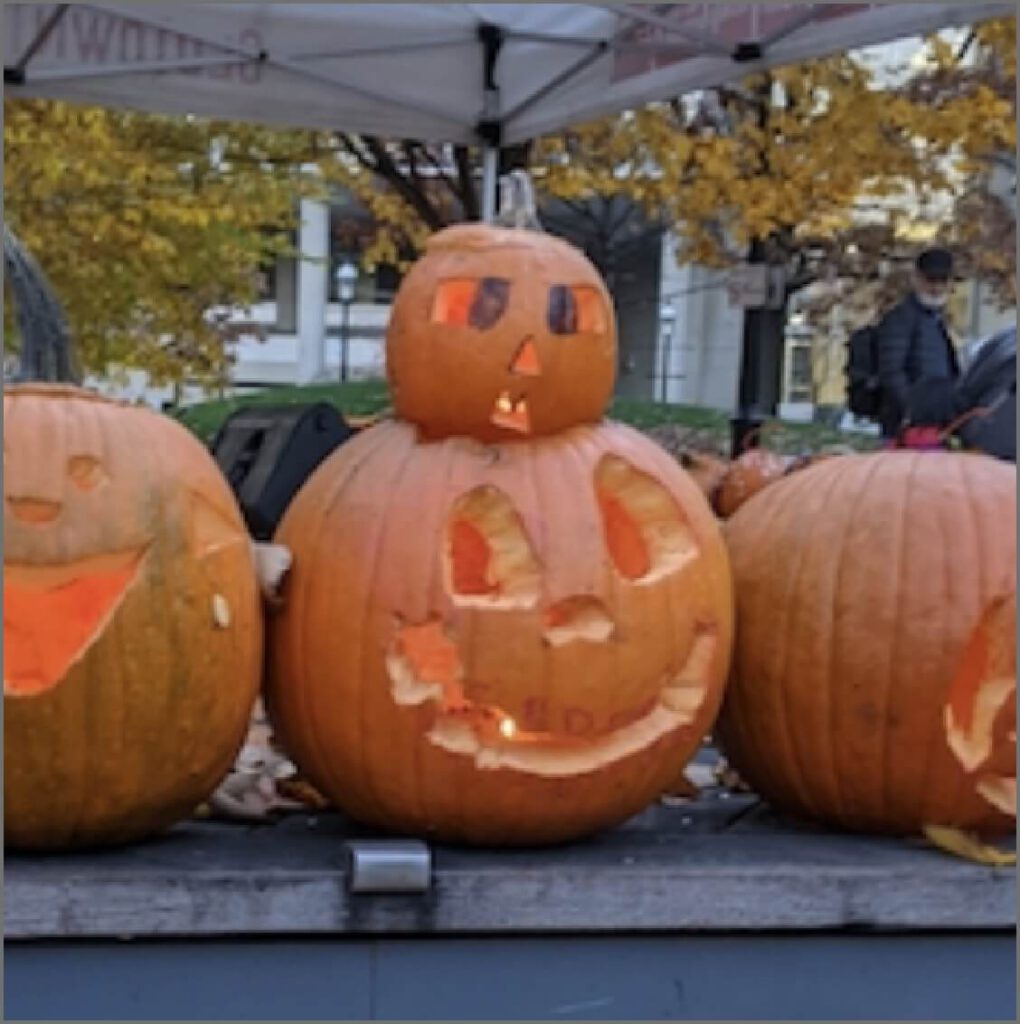 Carved pumpkins placed side-by-side