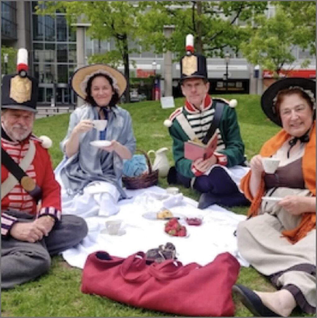 Historical re-enacters in costume gather in St. James Park